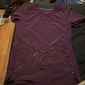 Purple woman’s scrub top $15